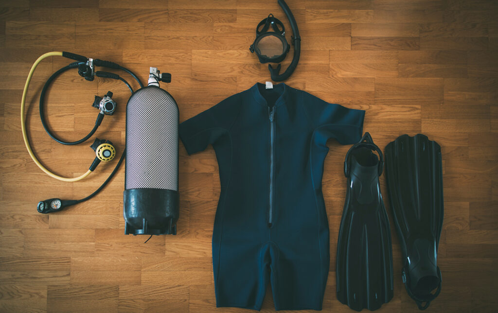 Diving equipment: O-ring, fins, snorkel set, wetsuit, tank and scuba regulator By yossarian6