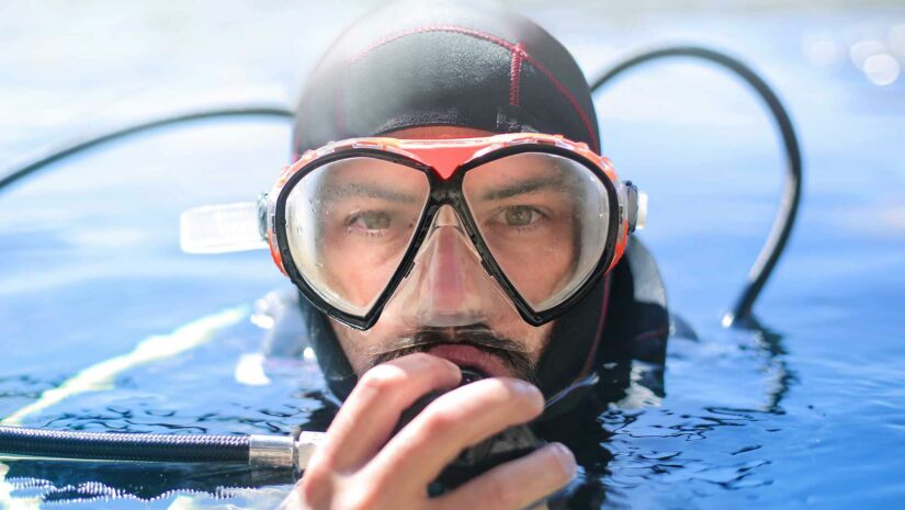 scuba diver wearing a mask