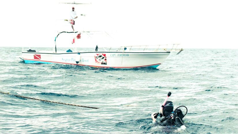 scuba diver by boat