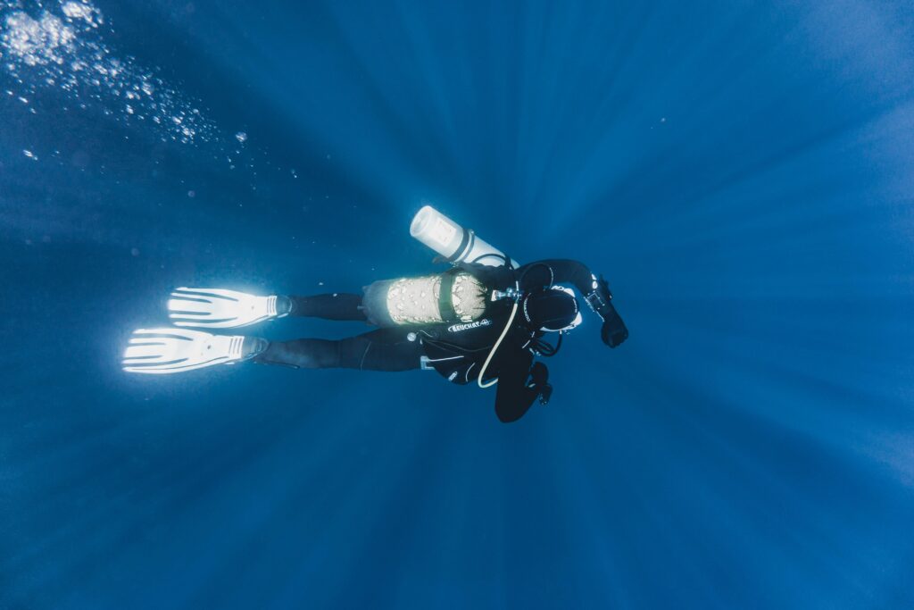 A diver in deep water