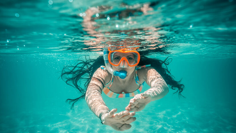 Woman diving in Cozumel