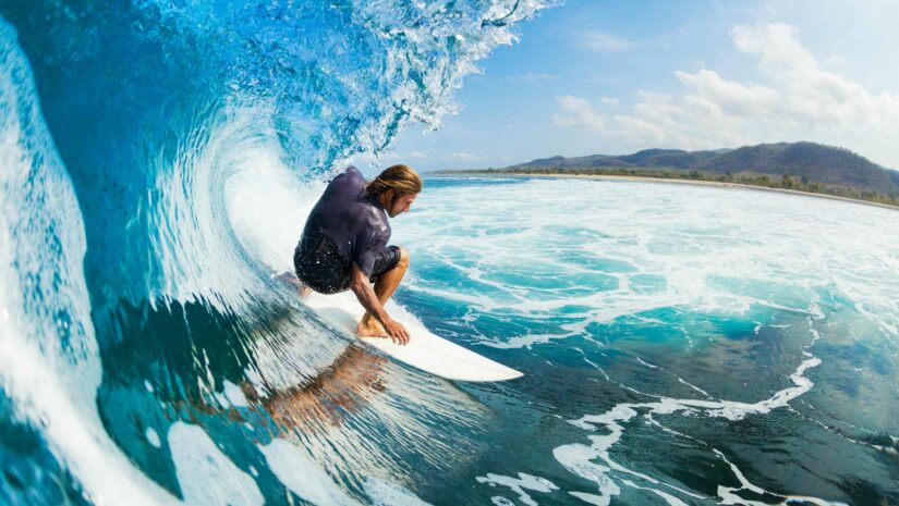 Male surfer in the middle of a wave