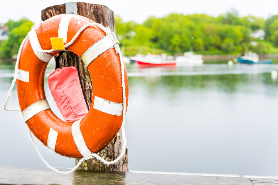 flotation device displayed near body of water