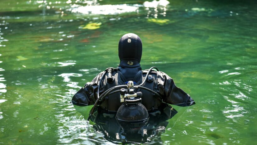 scuba diver wearing a drysuit