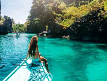 Female freediver cruising the waters around Coron