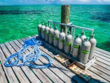 nitrox tanks on a dock