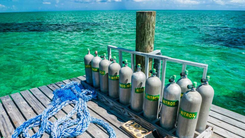 nitrox tanks on a dock