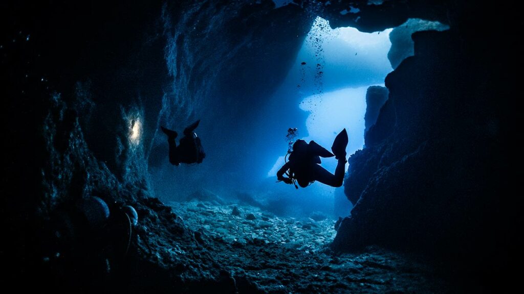 cave diving underwater divers