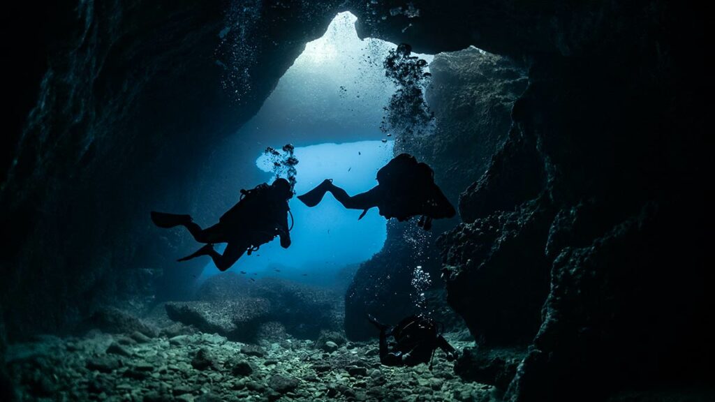 cave diving underwater divers