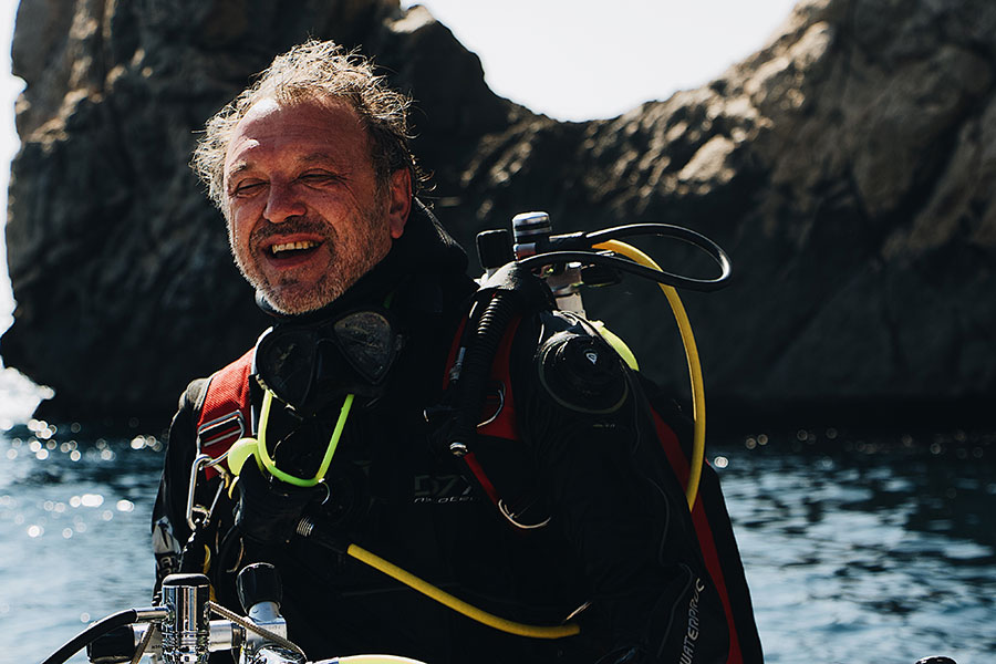 diver by the shore preparing to dive