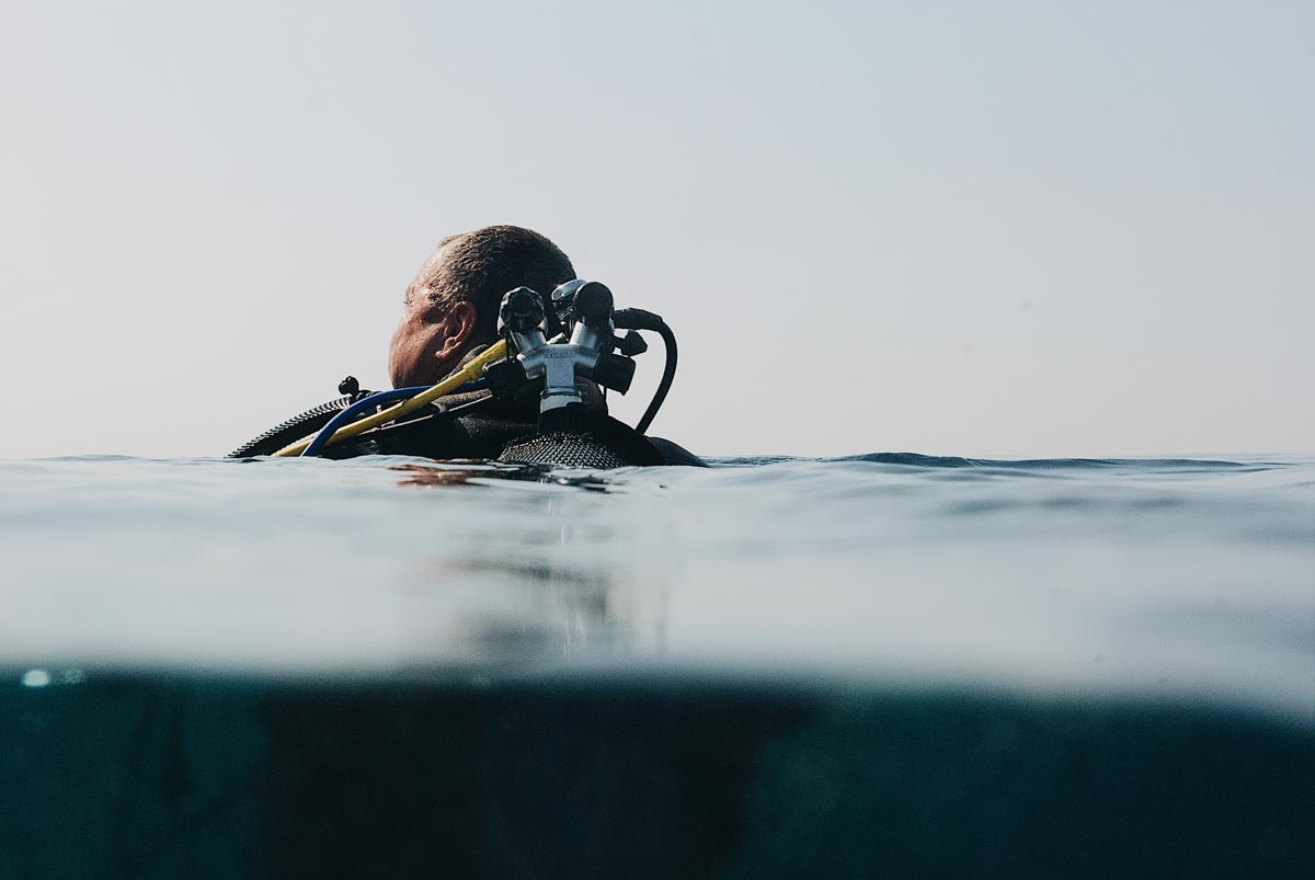 scuba diver above water