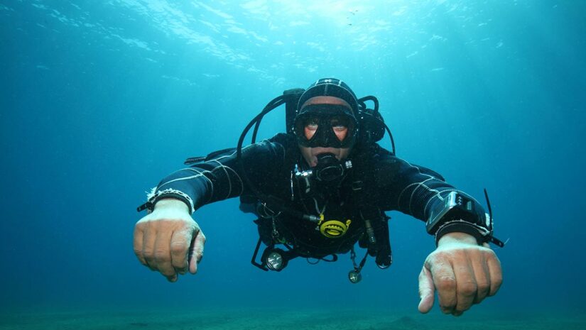 drysuit diving diver in water