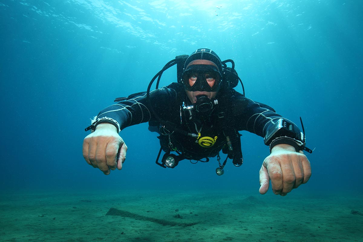 drysuit diving diver in water