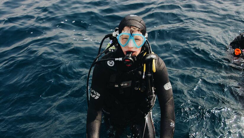 scuba diver entering water health benefits of scuba diving