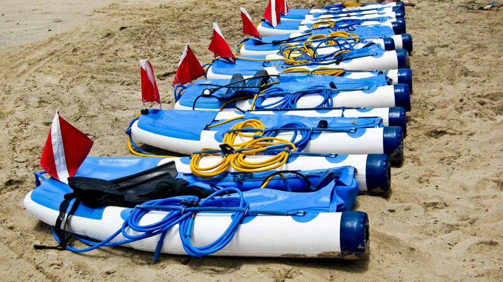 snuba diving equipment on beach