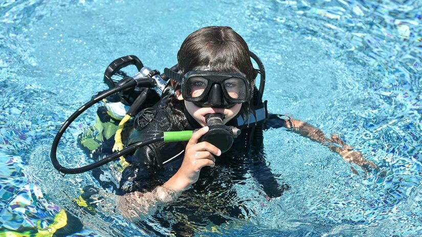 child scuba diving