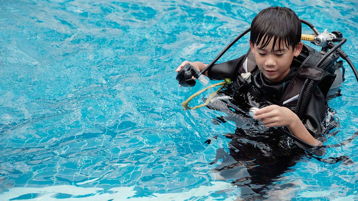 child scuba diving