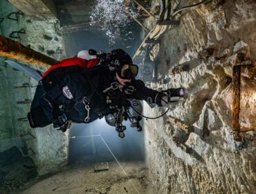 cold water diving underwater in bare drysuits