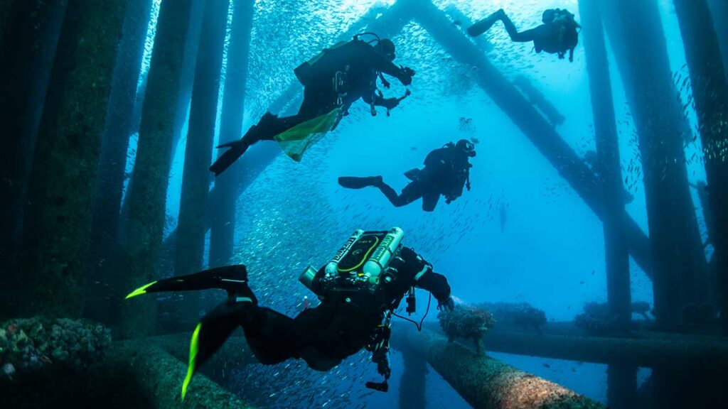 scuba diver doing rebreather diving underwater