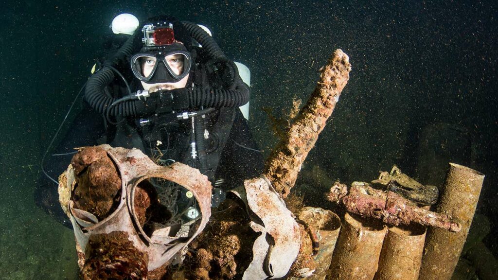 scuba diver doing rebreather diving underwater