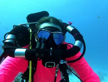 scuba diver doing rebreather diving underwater