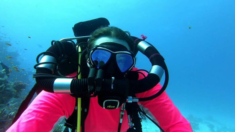 scuba diver doing rebreather diving underwater