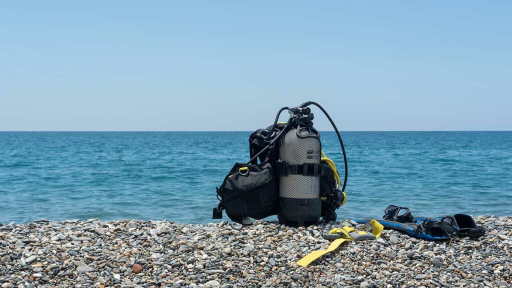 diving equipment on beach shore
