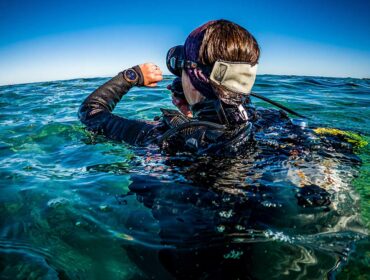 scuba diver with dive computers