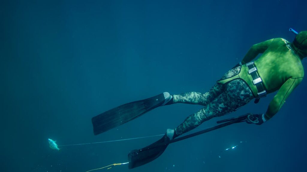 spearfisher underwater