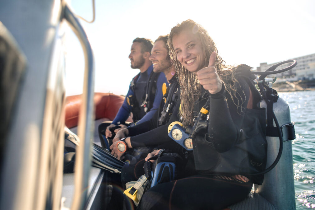 a female diver advertising underwater navigation tips