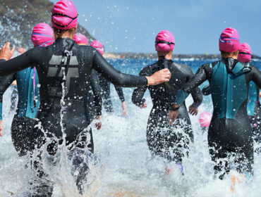 A group of people participating in an aquathlon