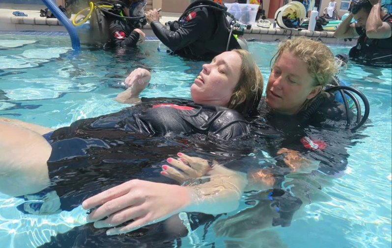 a Diveheart instructor teaches adaptive diver