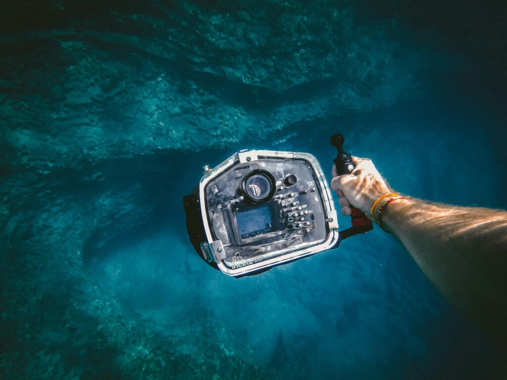 A man using an underwater camera