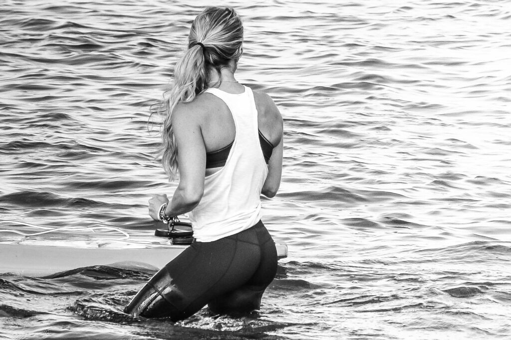 a SUP yoga person in the water