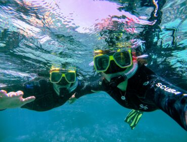a photo of two people who bought the best gifts for snorkelers