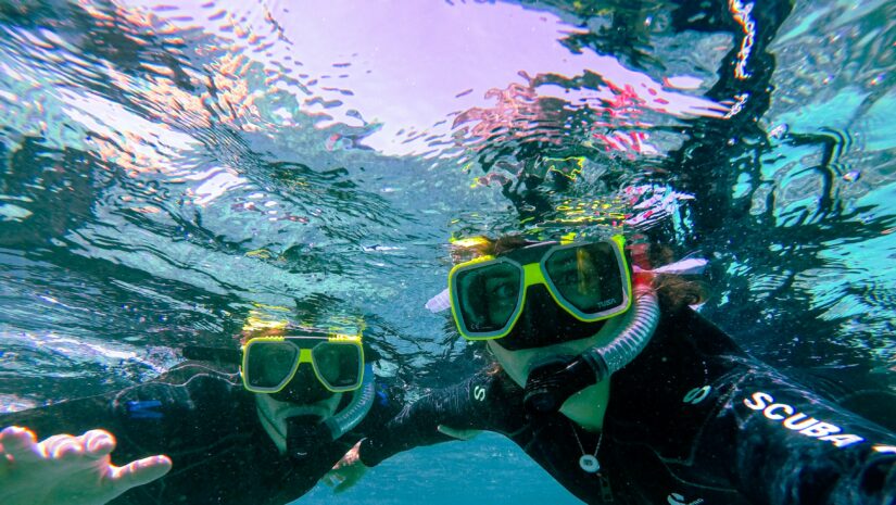 a photo of two people who bought the best gifts for snorkelers
