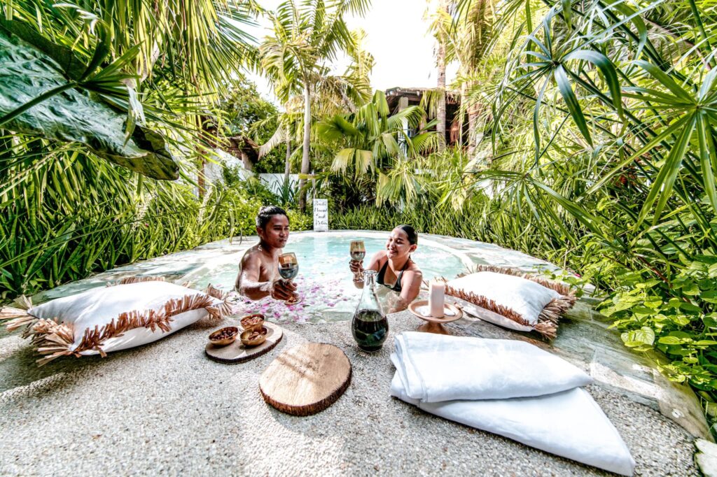 a couple taking a break from their Malapascua diving itinerary on the pool