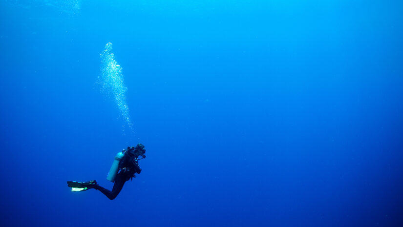 Deep Diver Specialty - feature image, diver in empty blue water