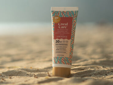 Stream2Sea Eco-sunscreen bottle on beach