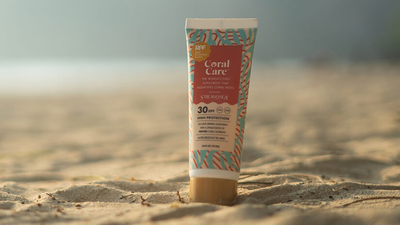 Stream2Sea Eco-sunscreen bottle on beach