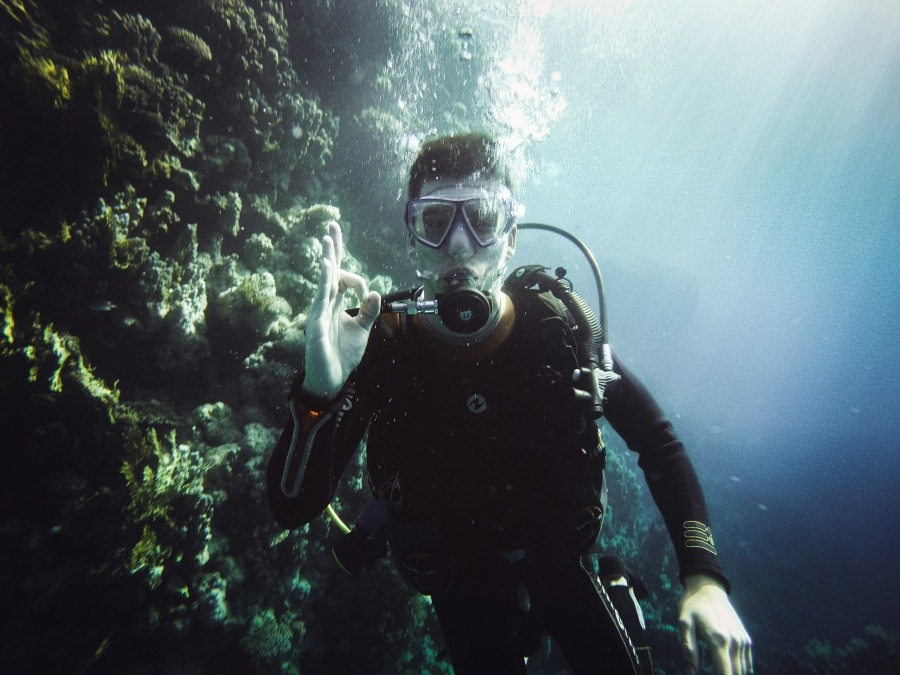 man wearing drift diving gear